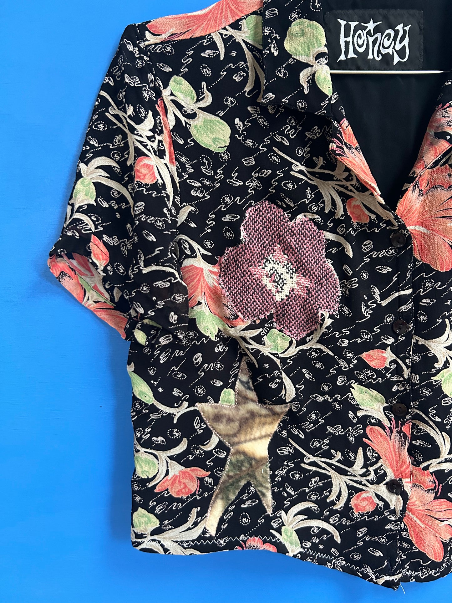 floral patched blouse