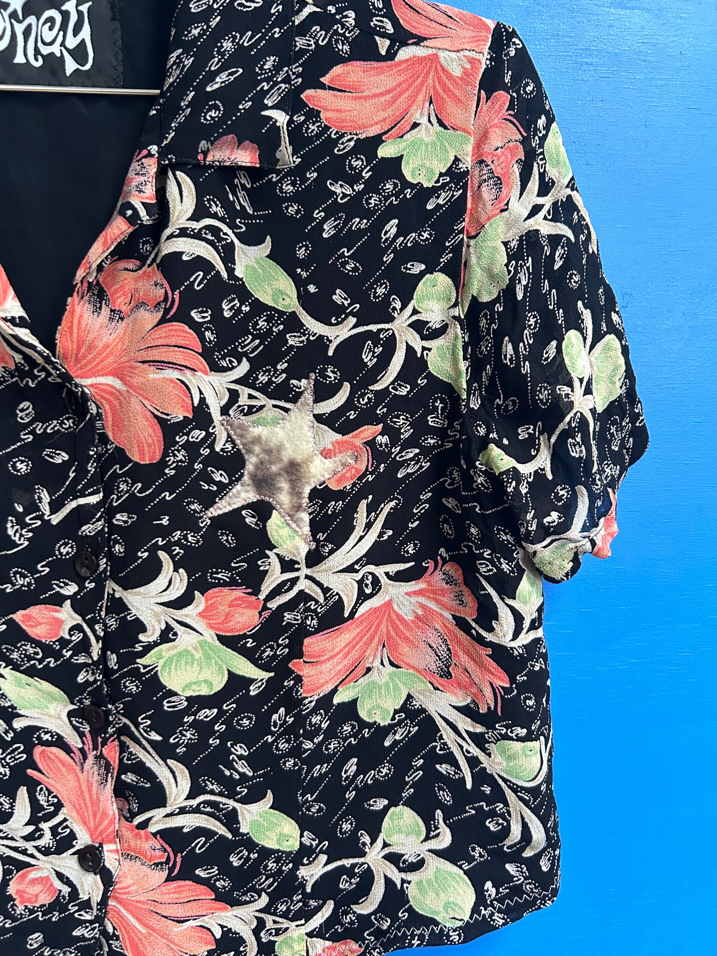 floral patched blouse